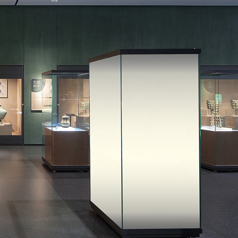 Museum display cases with PNLC smart film, power on - glass turns opaque to hide exhibits