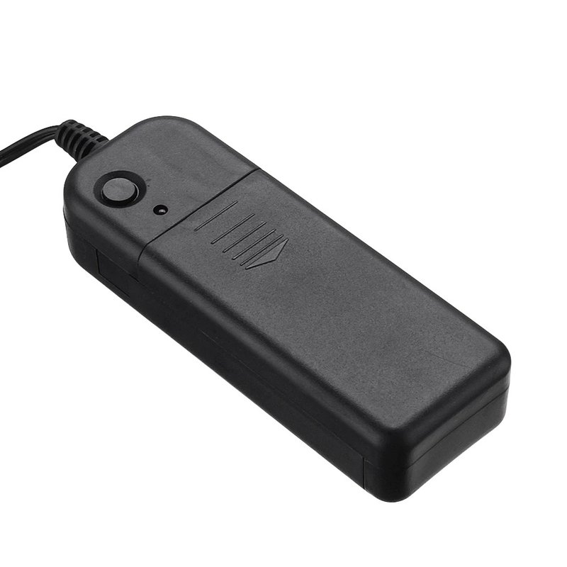 AA-battery sample power supply with test button, close-up